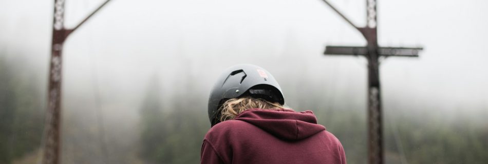 person wearing maroon hoodie